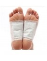 Feet with white detox patches